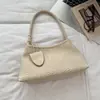 Bolsa de ombro/axila lisa com padrão trançado para o dia a dia, novo modelo outono 2026, alto valor estético, sensação relaxada, bolsa de mão de nicho, moderna