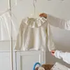 Camiseta estilo coreano para primavera e outono para meninas, com estampa floral, mangas compridas, gola com babados e design estilo boneca, perfeita como um top moderno.
