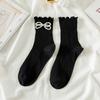Primavera y Verano nuevo dulce fresco Perla lazo hongo encaje algodón calcetines de media pantorrilla niña calcetines ins calcetines de rizo blanco y negro
