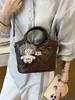 Bolso Pequeño Retro de Nuevo Estilo de Alta Gama Transfronterizo 2026 para Mujer, Bolso Cruzado Versátil para Hombro, Bolso Cubo de Moda