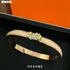 Estilo de celebridade da internet Pulseira com letra H da Hermes Esmalte Artesanato Estilo clássico V Ouro Artesanato Pulseira Fivela de letra Pulseira de pulso Casal Homens Mulheres