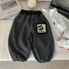 Pantalones de Pierna Ancha para Niños 2026 Nuevo Estilo Primavera Niños Caricatura Versátiles Estilo Coreano Pantalones de Punto Sueltos Modernos Rayados Modelo Primavera