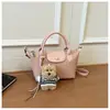 Bolso de Mano Tejido Nuevo de Moda Verano 2026 para Mujer, Bolso de Hombro Elegante y Sencillo, Bolso Cruzado de Diseño Retro y Único