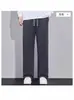 Marca da moda outono/inverno 2026, calça de moletom esportiva lisa e simples com forro de fleece para homens, estilo de rua retrô, corte solto, calça casual versátil