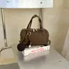 Bolsa de Bowling Portátil Retrô Transfronteiriça Feminina 2026 Novo Estilo Simples para o Dia a Dia Design de Nicho Bolsa de Ombro Transversal