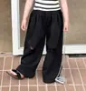 Otoño 2026 Nuevo Estilo Coreano Ropa Infantil Niñas Pantalones Casuales Sueltos de Color Sólido Pantalones Rectos Vintage Desgastados Pantalones Deportivos