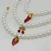 Pulsera Cruzada de Amazon de Nuevo Producto Moda Lujo Ligero Simple con Cuentas de Chile Rojo Pulsera Personalizada con Colgante de Cereza para Mujer