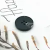 Botón de resina con patrón de cuatro ojos para gabardina, abrigo, pantalón, traje, venta al por mayor de fábrica, botón spot