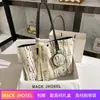 Una generación de bolso tote de gran capacidad de alta gama 2023 moda portátil bandolera mensajero al por mayor