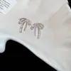 Aretes de Lazo con Goteo de Aceite de Aguja Plateada para Mujer, Aretes Dulces, Delicados y Elegantes con un Toque de Lujo Ligero y de Alta Gama, Presentando un Diseño Único