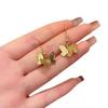 Pendientes retro elegantes con forma de mariposa tridimensional, estilo femenino, diseño de nicho ligero y lujoso, combinables con todo, nuevos y sencillos.