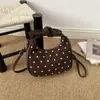 Bolso Cruzado de Hombro Casual de Moda Textura Simple Bolsos Nuevos Otoño 2026 Bolso de Dumpling Elegante con Personalidad para Mujer