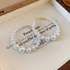 Pulsera Abierta de Perlas Vintage Estilo Francés con un Diseño Único, Versátil y a la Moda, Exudando un Toque de Lujo