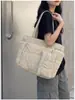 Bolsa de algodón de color liso, simple y elegante, bolso de mano de moda, bolso tote de un solo hombro, para llevar debajo del brazo, nueva versión coreana, primavera 2026