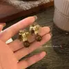 Pendientes Retro de Flor Manchada Maillard para Mujer, Lujo Accesible de Nicho, Pendientes Elegantes de Gama Alta, Pendientes Únicos y Hermosos