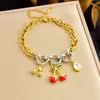Diseño de Nicho Transfronterizo Colgante Multielemento Cadena Chapada en Oro Costura de Color Contrastante Accesorios de Estrella de Mar Cereza Concha Pulsera
