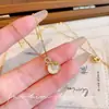 Collar con Lazo de Piedra Ojo de Gato para Mujer, Diseño de Nicho Estilo Ins, Suave y Elegante, Joyería de Cadena para Clavícula de Circonita de Alta Gama