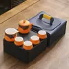 Juego de té de viaje traje pequeño cerámica exterior hogar Kung Fu una tetera cuatro tazas tetera taza portátil regalo creativo