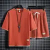 Traje deportivo casual de punto gofre para hombre, fresco y moderno para el verano, conjunto holgado de manga corta y pantalones cortos, atuendo elegante