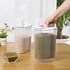 Cubo de arroz portátil con taza medidora, tarro de almacenamiento multi-grano para cocina, tarro de plástico sellado a prueba de humedad, tarro de almacenamiento de alimentos de 2 kg, venta directa