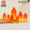 Botella de Aceite Esencial con Gradiente Naranja Personalizada al por Mayor 5-100ml Botella de Vidrio con Gotero Botella Dispensadora Cosmética Botella de Esencia