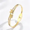 Pulseira Borboleta Dourada para Mulheres Aço Titânio Ecológico 18K Pulseira Que Não Desbota Estilo Europeu e Americano Transfronteiriço Pulseira Aberta Duas Borboletas
