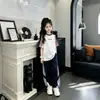 Conjunto deportivo para niñas, nueva ropa de verano para niños, elegante ropa de entrenamiento de secado rápido para estudiantes de secundaria, atuendo de verano para niñas mayores