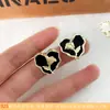 Pendientes de Diamante Amor de Aguja Plateada Europeos y Americanos Exagerados de Color Industria Pesada Sentido Avanzado Pendientes Artísticos Retro Media Antigüedad Pendientes Mujer
