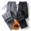 Calça casual masculina 2024 outono e inverno nova forrada com fleece espessa estilo coreano bolso na ponta do pé zíper calça plus size geração