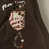 Pulsera de gato KT con estampado de leopardo adecuada para funda de teléfono Apple 18pm iPhone 17 Otoño/Invierno 16 Linda 14 Silicona 15 Dibujos Animados