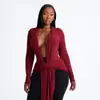 Ropa de mujer para comercio exterior europeo y americano 2026 otoño nuevo color liso manga larga cuello en V profundo fruncido retorcido sexy con cinta top camiseta