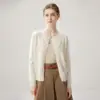 Cachemira rara y exquisita: un cárdigan de punto 100% cachemira pura, suave y cómodo para mujer, con un pequeño estampado de lunares y un diseño calado.