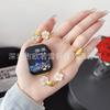 Adecuado para la pulsera del reloj Apple, cadena de reloj retráctil Apple Watch Camellia, correa de reloj de moda de la generación iwatch98765