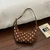 Bolso de Axila de Lunares Fresco y Dulce para Mujer 2026 Principios de Otoño Elegante Bolso de Albóndiga Plegado de Nicho Bolso de Hombro Único Versátil para el Trabajo