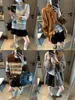 Falda Corta de Encaje Elástico de Cintura Alta en Forma de Capullo Línea A con Cordones, Lazo Favorito de la Blogger Mochie, Reductor de Edad MQ2018