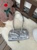 Bolso de Hombro Único con Lazo para Mujer 2026 Nuevo Modelo Bolsa de Bowling Texturizada Negra Bolso de Viaje de Moda
