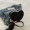 Bolso Pequeño de Moda en Forma de Corazón 2026 Primavera Nuevo Elegante Bolso Cruzado con Relieve Diseño de Nicho Ins Bolso de Hombro
