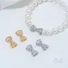Cuentas Espaciadoras de Cobre Chapado en Oro de 14 Quilates con Forma de Lazo y Agujero Pasante para Accesorios de Pulseras de Cristal y Perlas DIY