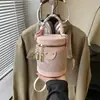 Elegante Diseño de Nicho Bufanda de Seda Bolso Redondo Cilíndrico de Mano para Mujer 2026 Nueva Moda de Primavera Bolso Cruzado Bolso Cubo Simple
