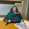 Bolsa de Moda Versátil para Mulheres 2025 Novo Modelo Bolsa Pequena Leve de Tecido Oxford Bolsa de Lona Feminina Bolsa Transversal Casual