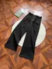 Pantalones de diseño nicho estilo americano con pliegues y botones para hombre y mujer, nuevos 2026 de alta calle, ajustados, de cintura alta, pierna ancha