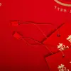 Etiquetas Personalizadas Criativas 2026 Novo Modelo Vermelho Estampagem Imitação Ouro "Realização de Desejos" Etiquetas para Presente Personalizadas da Fábrica de Hangzhou
