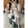Al por mayor transfronterizo otoño e invierno coreano cuello redondo hilo algodón holgado talla grande ajustado manga larga camiseta top interior para mujer