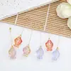 Aretes colgantes de pez pequeño iridiscente con ganchos para la oreja, clips para orejas sin perforación, estilo de doble uso, ambiente fresco y juvenil, accesorio versátil y favorecedor