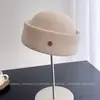 Boina de lana redonda de estilo retro de moda para mujer, un sombrero de invierno elegante y versátil, que irradia elegancia y calidez, perfecto para azafatas