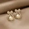 Brincos de borla com pérolas artificiais, com um toque de luxo leve e sofisticado, pingente feminino moderno cravejado de diamantes, brincos versáteis