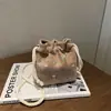 Bolsas Tejidas 2026 Nueva Primavera Estilo Coreano Diseño de Nicho Bolso Cubo Fresco y Sencillo Bolso Tejido de Encaje