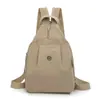 Mochila de Viaje de Gran Capacidad para Mujer Nueva Mochila Pequeña Ligera Bolso Versátil de Hombro y Pecho Bolso Cruzado de Textura de Moda