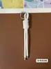 Llavero de cordón de cuero PU transfronterizo, colgante versátil para bolso, accesorios de decoración para botellas de agua y muñecas DIY, llaveros al por mayor