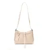 Bolso tejido de alta gama, lujo ligero, de nicho para mujer, nuevo modelo 2026, simple, de gran capacidad, bolso de hombro tipo tote para ir al trabajo
